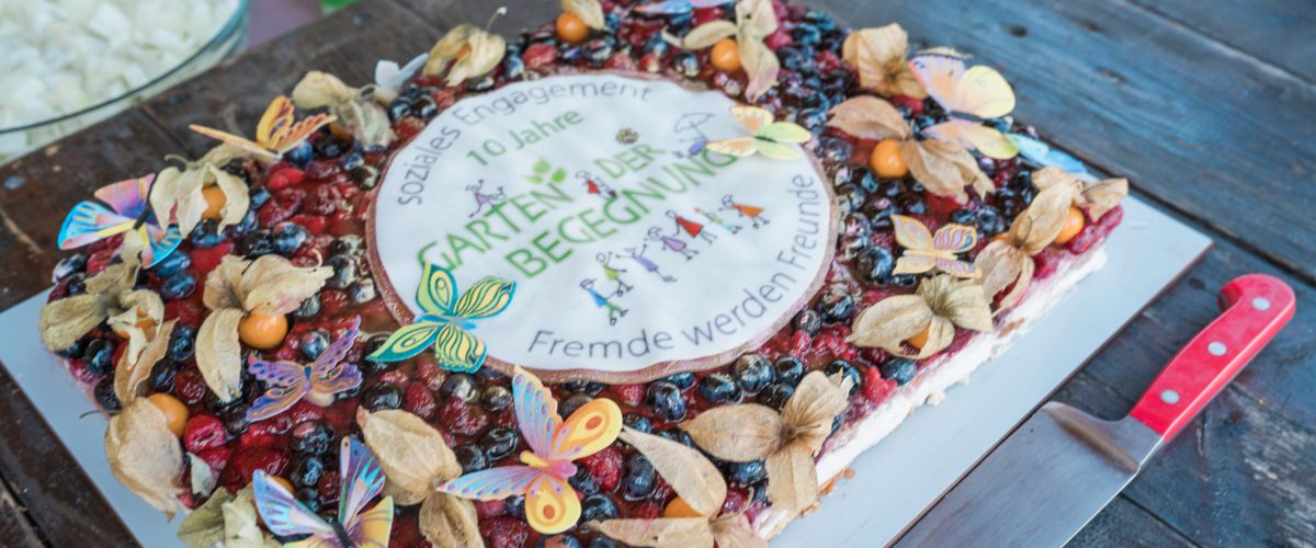 Jubliäumstorte anlässlich ”10 Jahre Garten der Begegnung”. Foto: Louai Abdul Fattah